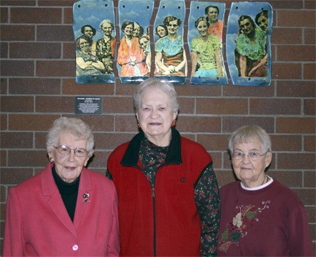 Officers of Redmond’s Nokomis Club stand in front of an art piece called “Women of Vision” in the lobby of the Redmond Regional Library. The art commemorates the organization’s role in establishing Redmond’s first public library in 1927. From left to right are Nokomis secretary Catherine Moody