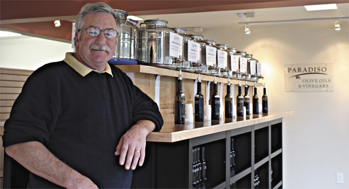 Kevin Carder is the owner of the newly opened Paradiso Olive Oils and Vinegars in downtown Redmond. The Education Hill resident opened the specialty shop with his wife Shirley (not picture) after visiting one in Arizona.