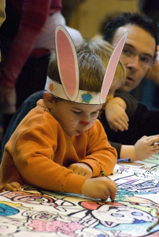 Nikolas Hake colors at Saturday's annual Eggstravaganza at the Redmond Senior Center. The event included an Easter egg hunt
