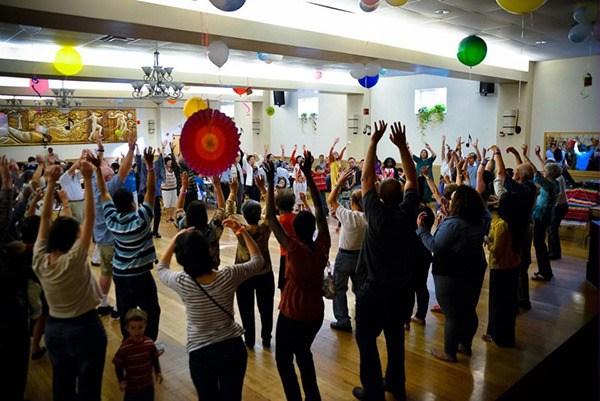 Participants learn a new dance at a previous World Dance Party (WDP) event in Seattle. The first WDP Eastside event will be on Saturday at the Old Redmond Schoolhouse Community Center.