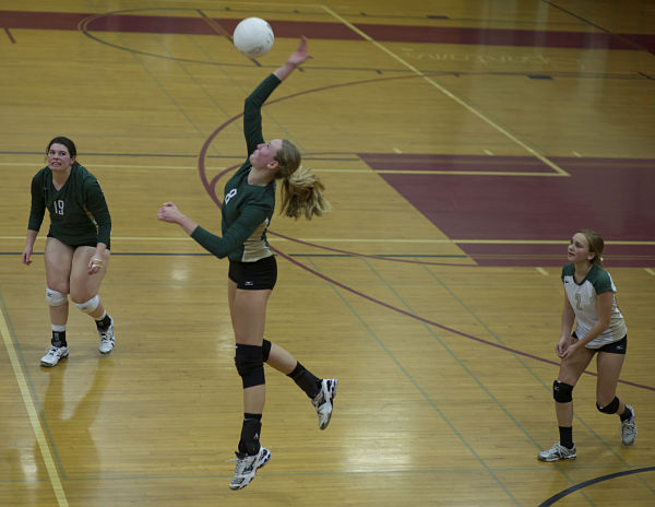 Bear Creek's Makena Schoene goes up for a kill during the district tournament.