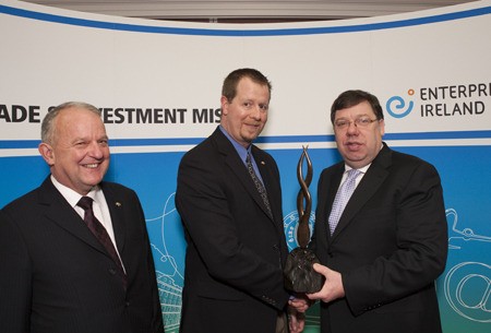 Ireland’s Prime Minister Brian Cowen (right) recently honored Chris Boody (middle) with the Meitheal Award on behalf of Enterprise Ireland. Boody is Director-Product Management