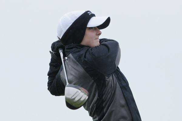 Redmond High golfer Keira O'Hearn tees off on the first hole during a match against Newport at the Golf Club at Newcastle in Bellevue Wednesday afternoon. Match play was suspended due to inclement weather.