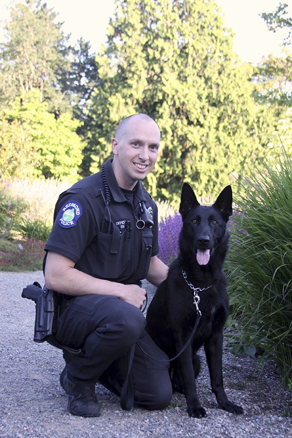 Redmond Police Department officer Dan Smith with K9 Remy.