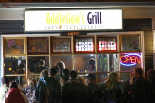 Loyal Shotty fans watch the Kirkland-based band’s set from outside of Oddfellow’s Grill last Friday night.