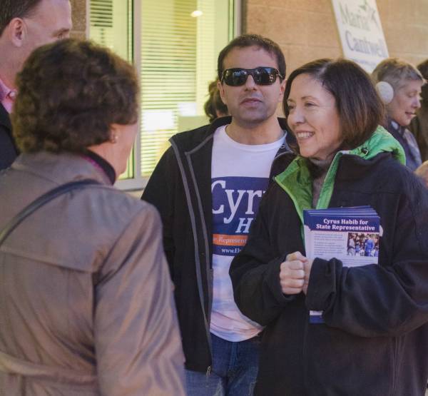 U.S. Sen. Maria Cantwell chats with commuters on Friday evening at the Overlake Transit Center in Redmond. She is joined by fellow Democrat and 48th District