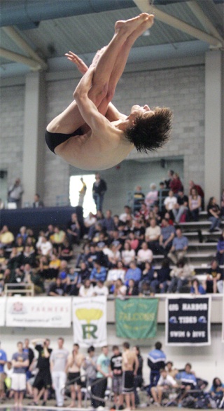 Redmond’s Max Klassen performs a dive on the way to earning the gold medal at Saturday’s Class 4A state swim and dive championship meet at the King County Aquatic Center in Federal Way.