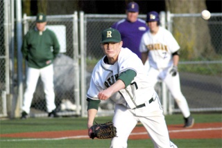 Redmond starter Mac Acker makes a pick-off attempt to first base on Tuesday against Issaquah. The Mustangs won the game