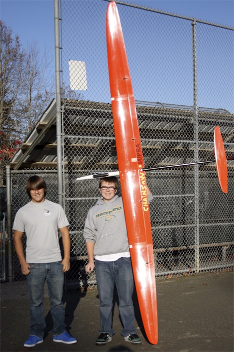 Redmond High School juniors Connor Laurel (left) and Michael Knight (right) show off the type of remote control sailplanes they’ll be flying in the F3J World Championship in France in July 2010. The boys are members of the Seattle Area Soaring Society and do their flying at 60 Acres South in Redmond and the Old Carnation Farm.