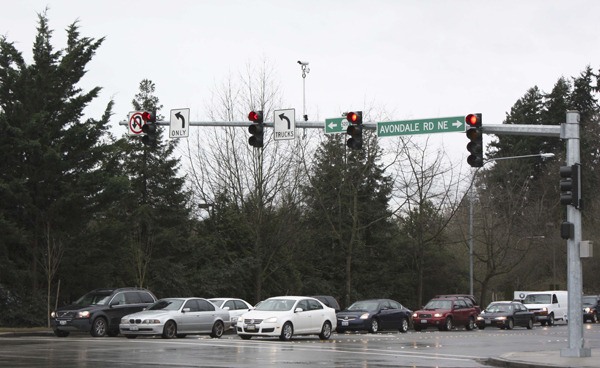 Cars line up at the intersection of Northeast Union Hill Road and Avondale Road Northeast