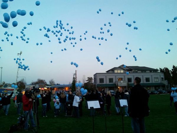 People release 369 balloons to mark the amount of days Sky Metalwala had been missing as of last Saturday at a gathering at Downtown Park in Redmond.