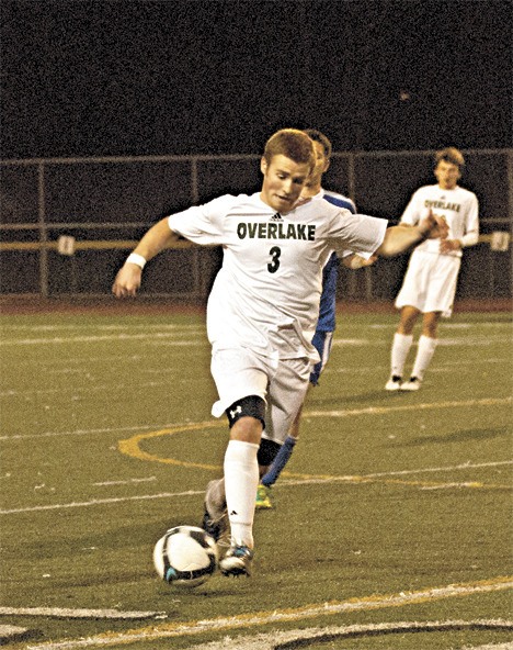 Overlake senior defender and team co-captain Grant Munoz moves the ball at midfield during the Owls' 1-0 loss to Cedar Park Christian on Tuesday night. Despite going 12-0-0 in 1A Emerald City League play