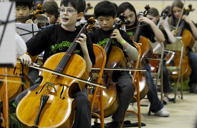 Nearly 400 string musicians played during String Jam '10 at the Juanita Field House in Kirkland on April 10. The fundraiser event set a new Guinness book of World Record for the largest string ensemble under one roof.