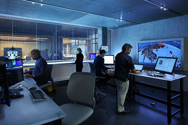 Members of Microsoft’s Digital Crimes Unit work in the forensics lab in the company’s new Cybercrime Center in Redmond.