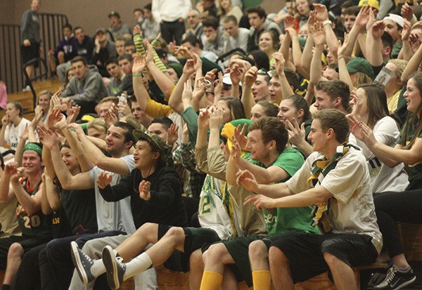 Redmond High students cheer their team on to victory on Tuesday night against Newport.