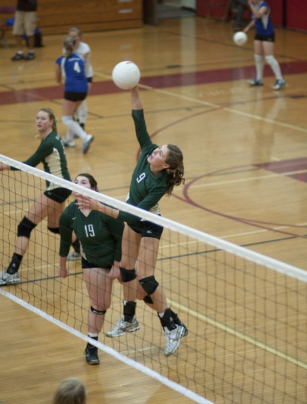Senior Elizabeth Fernandez goes up for a kill during the Grizzlies' run at the 2B District Tournament last weekend. The team won two matches before falling to La Conner in the final