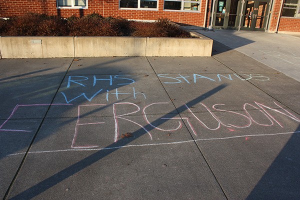 Messages such as this appeared in the entryway of Redmond High Monday. Other messages included statistics about black men