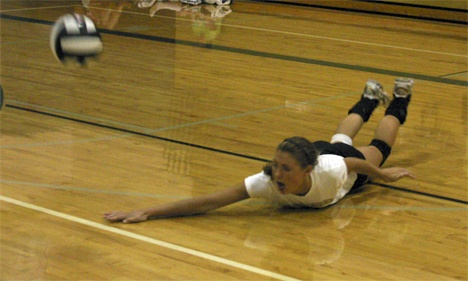 Sophomore middle hitter Elizabeth Fernandez dives for a dig during a recent volleyball practice at The Bear Creek School.