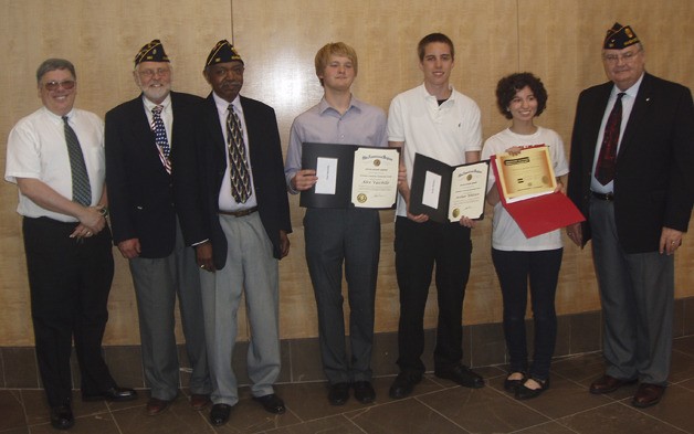 Representatives of American Legion Post 161 and Faith Lutheran Church were present to congratulate Community Scholarship Award winners at the July 6 Redmond City Council meeting. From left are Faith Lutheran Pastor Mark Peterson