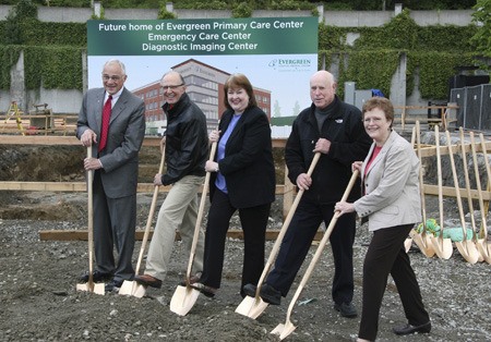 Evergreen Hospital Medical Center Board of Commissioners break ground Thursday morning for the new Evergreen Redmond Medical Plaza building at Bella Bottega. Commissioners