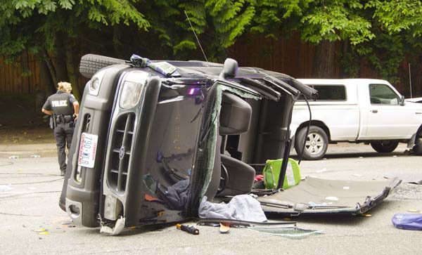 Bellevue-Redmond Road at Northeast 40th Street is closed after a rollover accident this morning around 6 a.m.