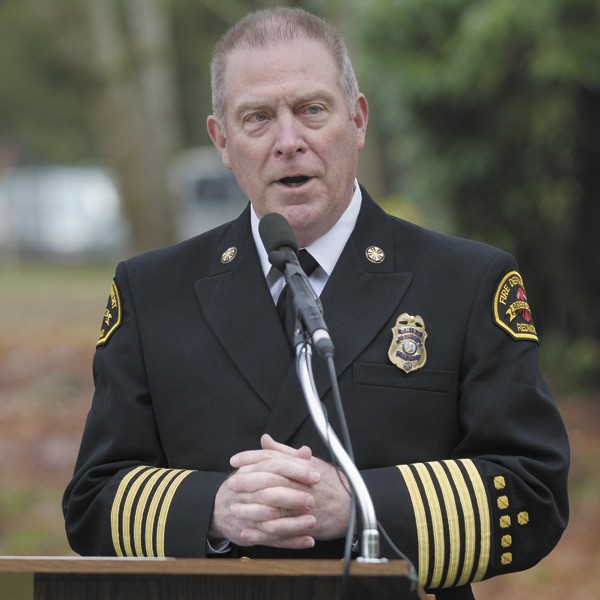 Former Redmond Fire Chief Tim Fuller speaks at the groundbreaking ceremony of the new Station 17. Fuller retired Jan. 31 a 40-year career as a firefighter. He was fire chief for Redmond for six years.