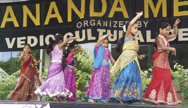 A group of girls dance on the Ganga Stage at this year's Anandamela festival