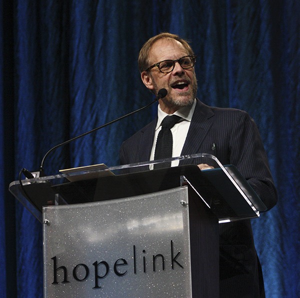 Food Network host Alton Brown addresses the crowd about the importance of Hopelink at the organization's Reaching Out Benefit Luncheon today at Bellevue's Meydenbauer Center.
