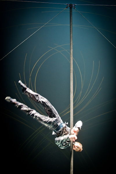 A Cirque du Soleil member performs his Chinese pole act.