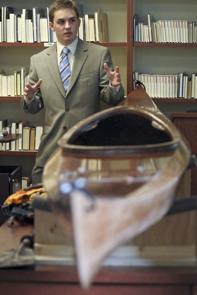 Hank Frantz talks about building a kayak during Capstone Project presentations at The Bear Creek School in Redmond on Wednesday. “There are some flaws but there’s a redeeming quality