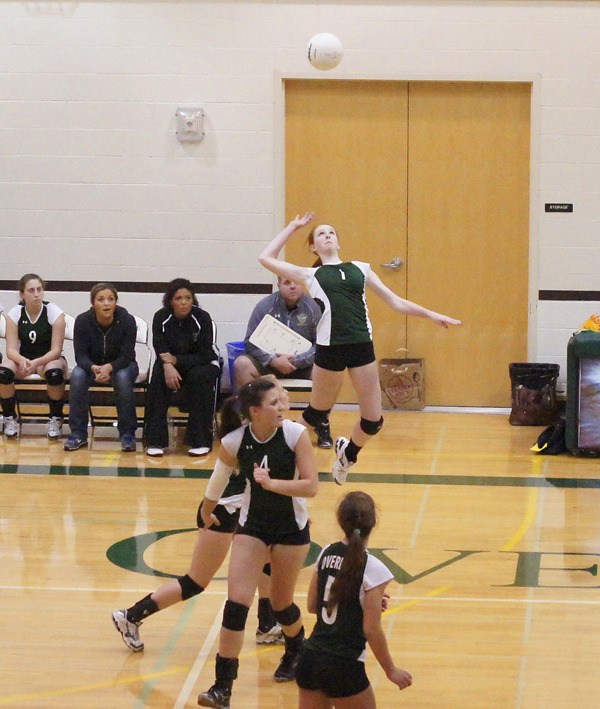 Overlake senior Kirsten Parris (No. 1) goes up for one of her game-high 11 kills during the Owls' 3-1 loss to Seattle Academy on Monday at home. The team will play the winner of Forest Ridge-Seattle Academy on Thursday in the opening round of the Emerald City League playoffs.