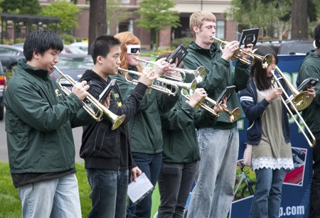 The Redmond High School pep band was part of the many performers and festivities as the Redmond Saturday Market season kicked off its 35th season May 1. The pep band members include