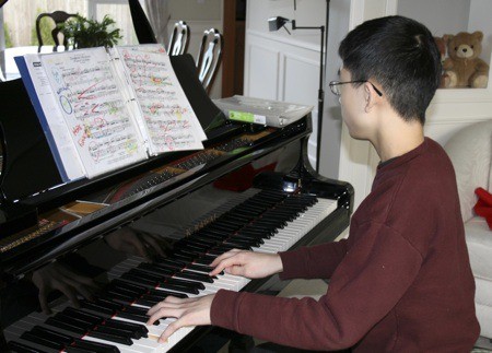Redmond's Christopher Lu is headed to New Mexico next month as one of seven national finalists in the MTNA (Music Teachers National Association) Junior Piano Competition. The eighth grader practices piano about 15 hours a week but also loves Xbox 360