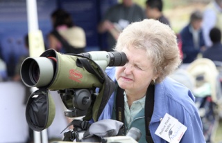 Melinda Bronsdon looks through a telescope at the wildlife viewing station during Saturday’s festival celebrating the grand opening of the Audubon BirdLoop Nature Trail at Marymoor Park. County executive Ron Sims joined with representatives from Eastside Audubon to dedicate the trail