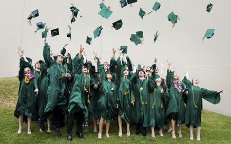 The Bear Creek School seniors toss their hats following the graduation ceremony last Saturday. There were 33 students part of the school's 2009 graduating class. The ceremony at the non-denominational Christian school on Union Hill included a prayer and was followed by a reception.
