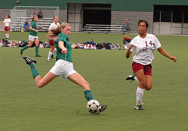 Overlake forward Adrianna Gildner fires a shot against Northwest School on Tuesday at Starfire Sports Complex in Tukwila. Gildner scored a goal and assisted twice in the Owls' 4-1 win