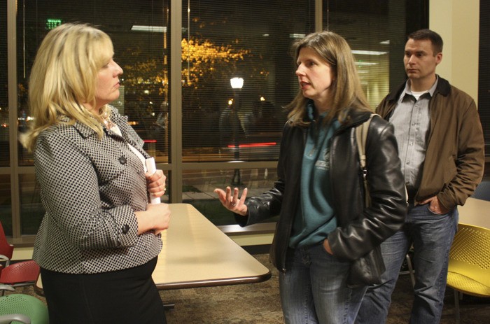 Deputy superintendent of instructional services for Lake Washington School District Dr. Traci Pierce (left) speaks with Kirkland resident Nicole MacKenzie at Tuesday's meet-and-greet event at Redmond City Hall. The meeting was held to give community members an opportunity to meet Pierce