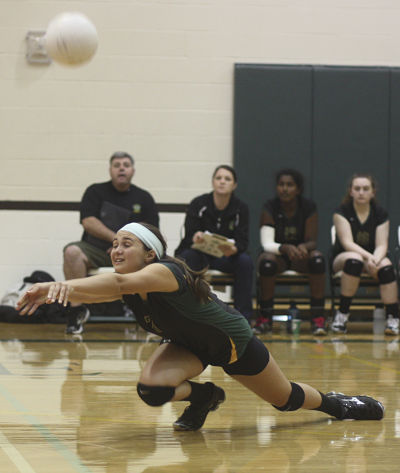 Overlake Owls defender Kiera Sullivan keeps the ball moving in Tuesday's three-game victory over Seattle Academy.