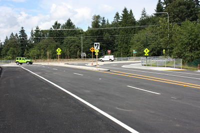 Drivers take the new roundabout at Northeast Novelty Hill Road and 195th Avenue Northeast. This photo is taken on 195th.