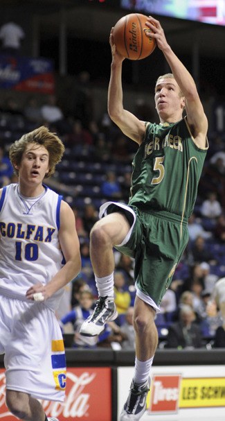 Bear Creek junior Lucas Peterson flies in for two of his career-high 28 points during the Grizzlies' 5th/8th place final at the 2B state basketball tournament. The Grizzlies defeated Colfax 63-33 to place fifth and bring home a trophy.
