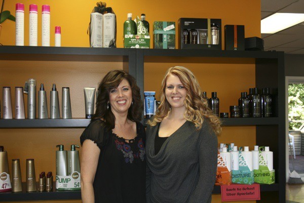 Sisters Cynthia (Glessner) Olson (left) and Paula Glessner-Vallee have opened G2 Salon in the Village Square Shopping Center in downtown Redmond. New clients can get a half-price haircut or a free haircut with chemical service. For information