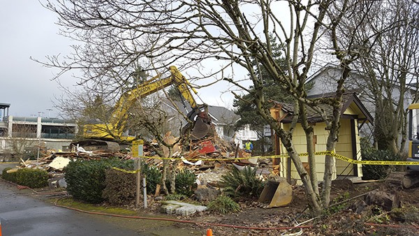 The old Nokomis building was torn down Friday afternoon.