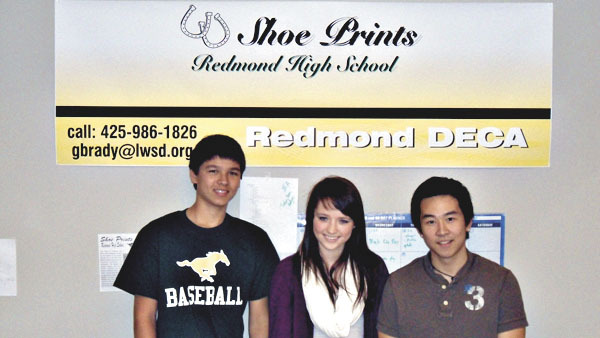 Redmond High School DECA students (from left) junior Luke Hatakeda and seniors Dana Klemmedson and Will Yoo started the printing company