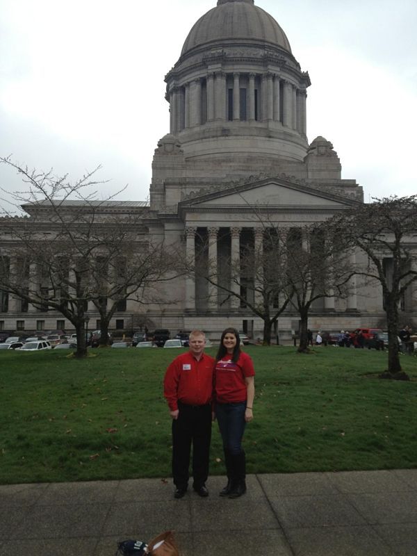 Redmond’s Andrew Sundene and Julie Tramp stand outside the Capitol Building in Olympia on Monday after meeting with Gov. Jay Inslee and other legislators as part of an American Diabetes Association teen and adult advocates group.