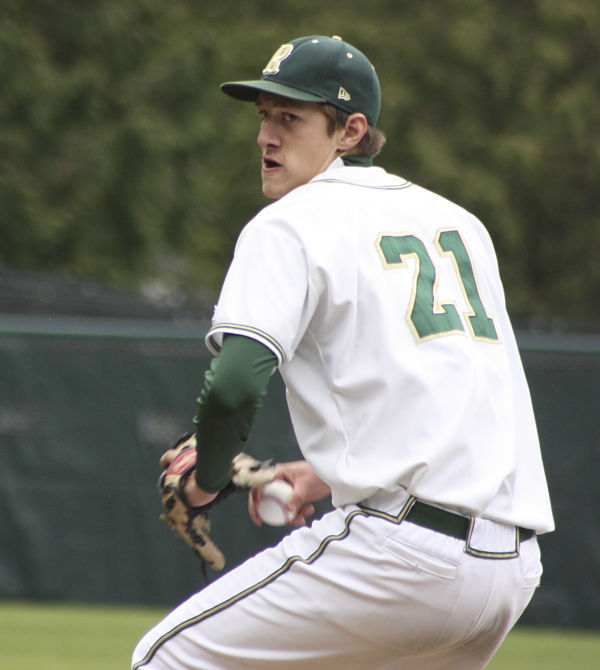Redmond High’s Daniel Bies prepares to fire away against Juanita High on Monday.