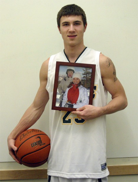 The Overlake School senior Trent Halvorson shows a picture of his himself with his mother