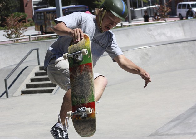 Jacob Campbell concentrates on completing his trick on the side of the bowl at Saturday's ninth annual RedSkate Skate Competition at The Edge Skate Park in downtown Redmond. After a successful execution