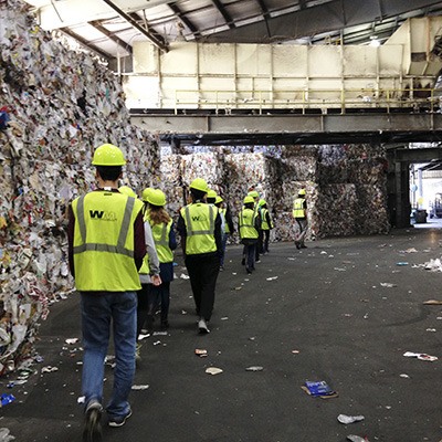 Students from Redmond’s Tesla STEM High School take a recent behind-the-scenes tour at the Waste Management Cascade Recycling Center in Woodinville.