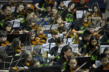 Nearly 400 string musicians from across the region performed during 'String Jam '10' at the Juanita Field House in Kirkland last Saturday. The fundraiser event was also a Guinness book of World Records attmept for the largest string ensemble under one roof.