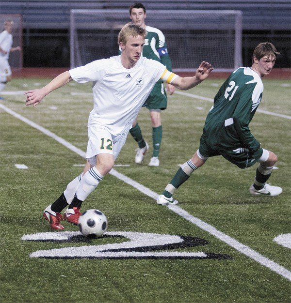 Redmond High School senior Tyler Bennett has embraced and shined at his new position at center midfield for the Mustangs